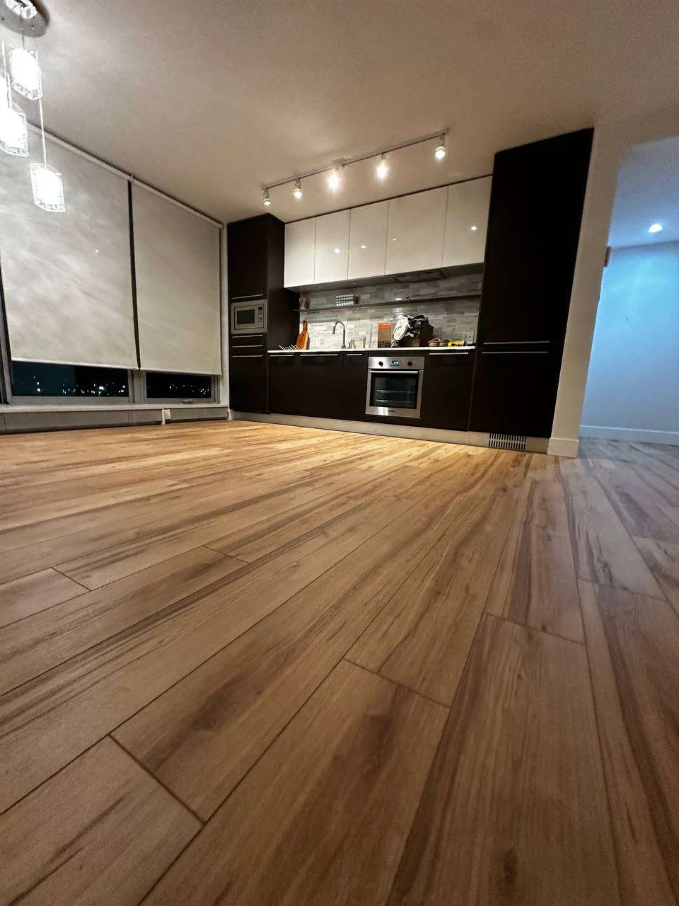 Finished vinyl flooring hero perspective in Vancouver apartment